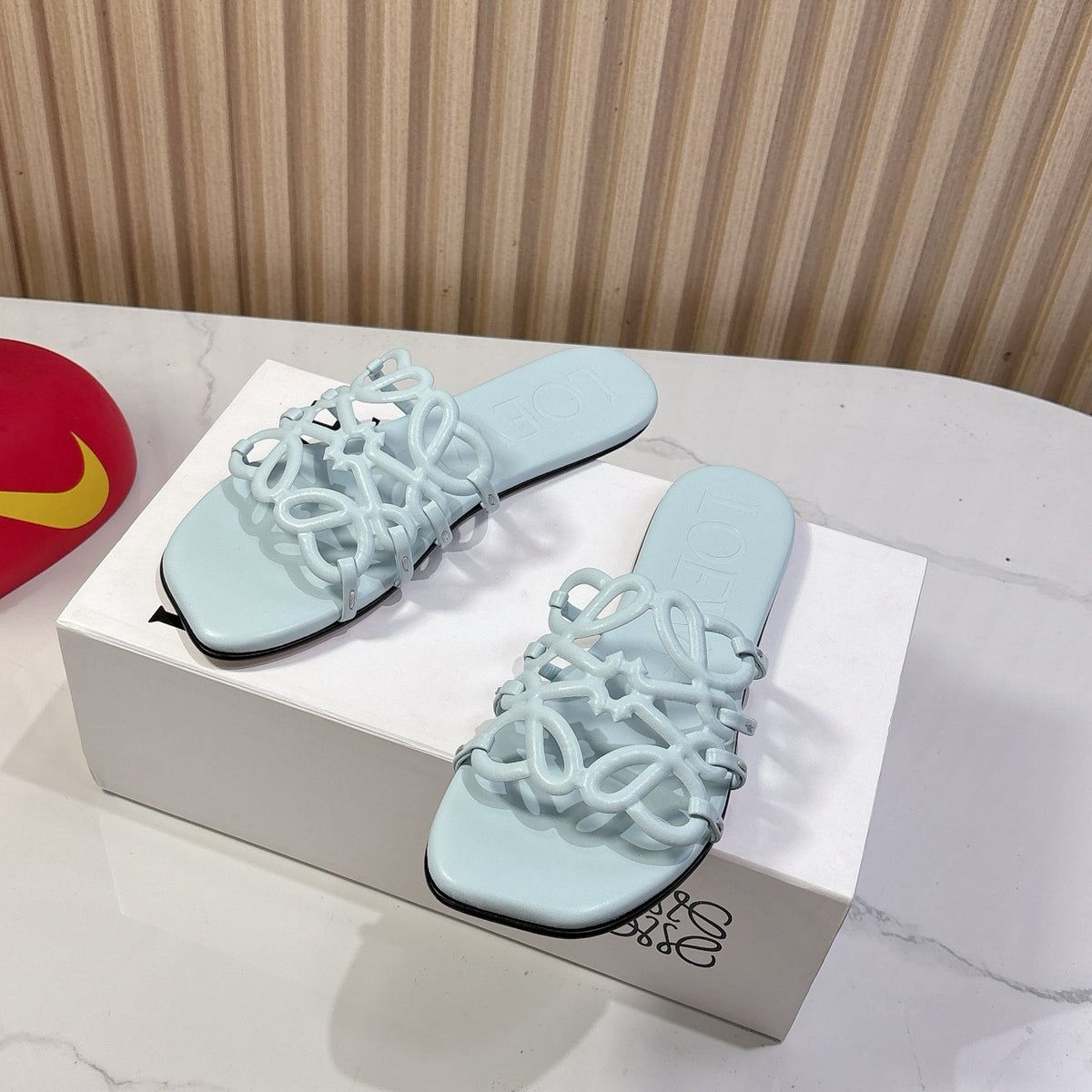 LOEWE PETAL ANAGRAM SLIDE SANDALS.