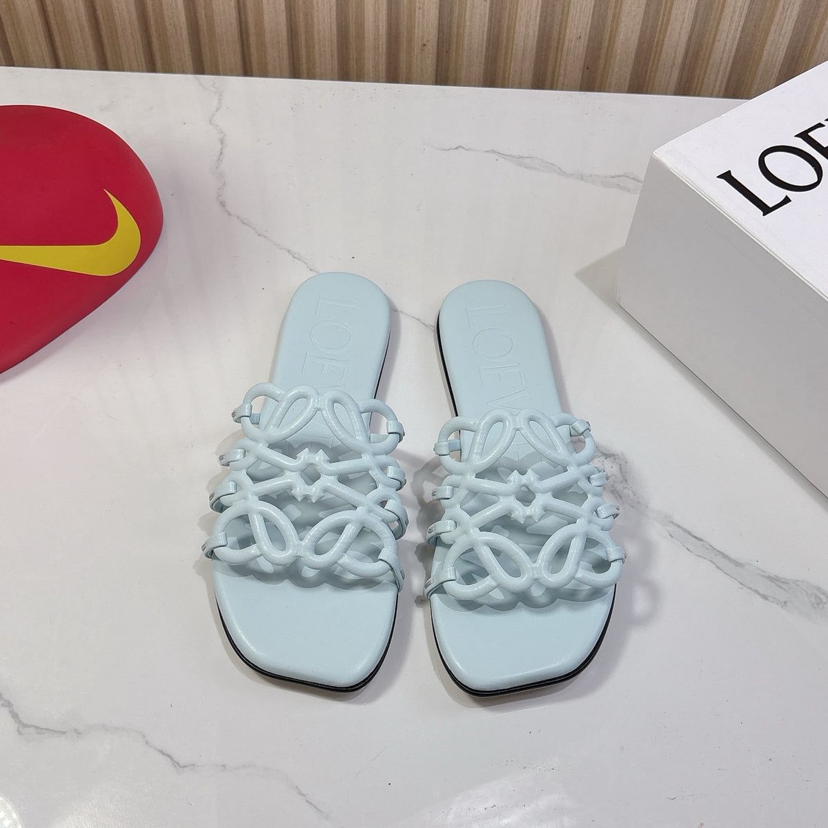 LOEWE PETAL ANAGRAM SLIDE SANDALS.