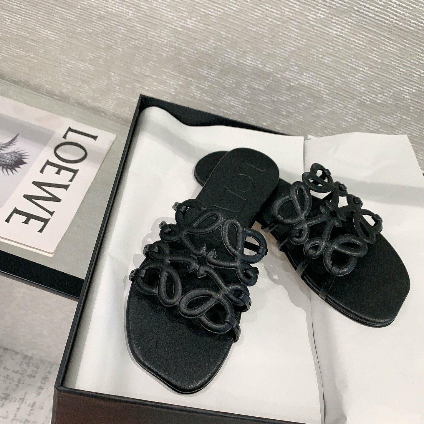 LOEWE PETAL ANAGRAM SLIDE SANDALS.