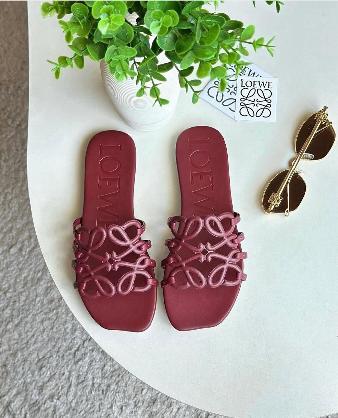 LOEWE PETAL ANAGRAM SLIDE SANDALS.